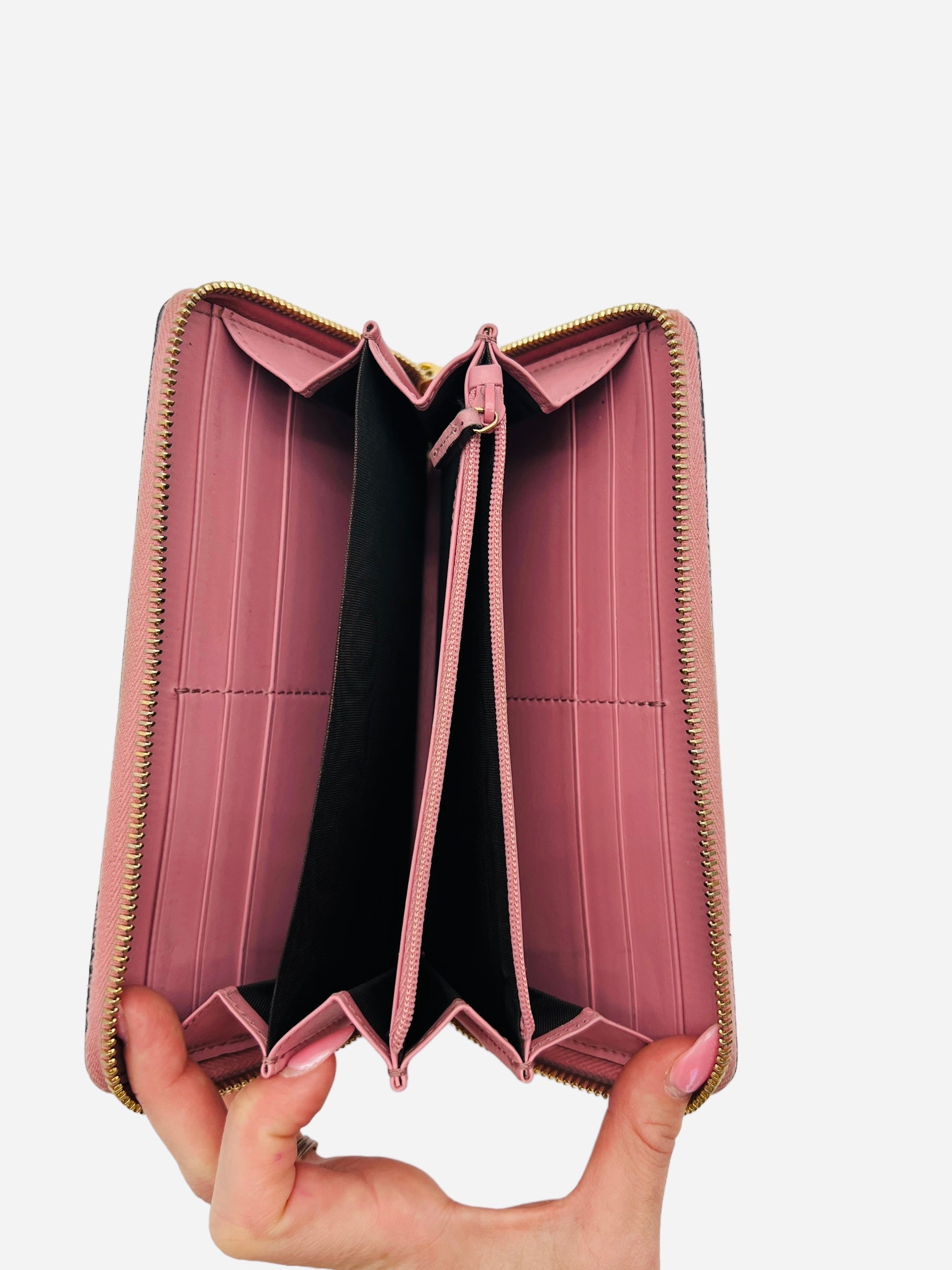 Gucci long pink zippy wallet