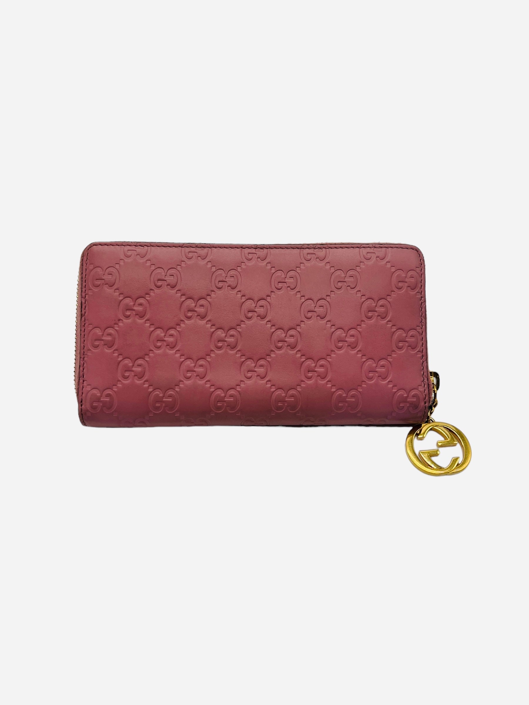 Gucci long pink zippy wallet